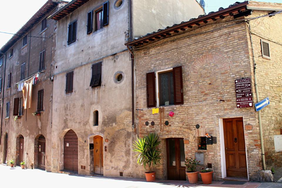san gimignano street with beautiful stone buildings