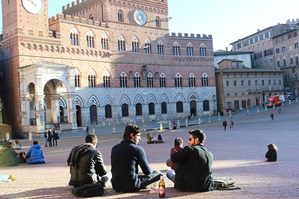main square in siena with locals hanging out