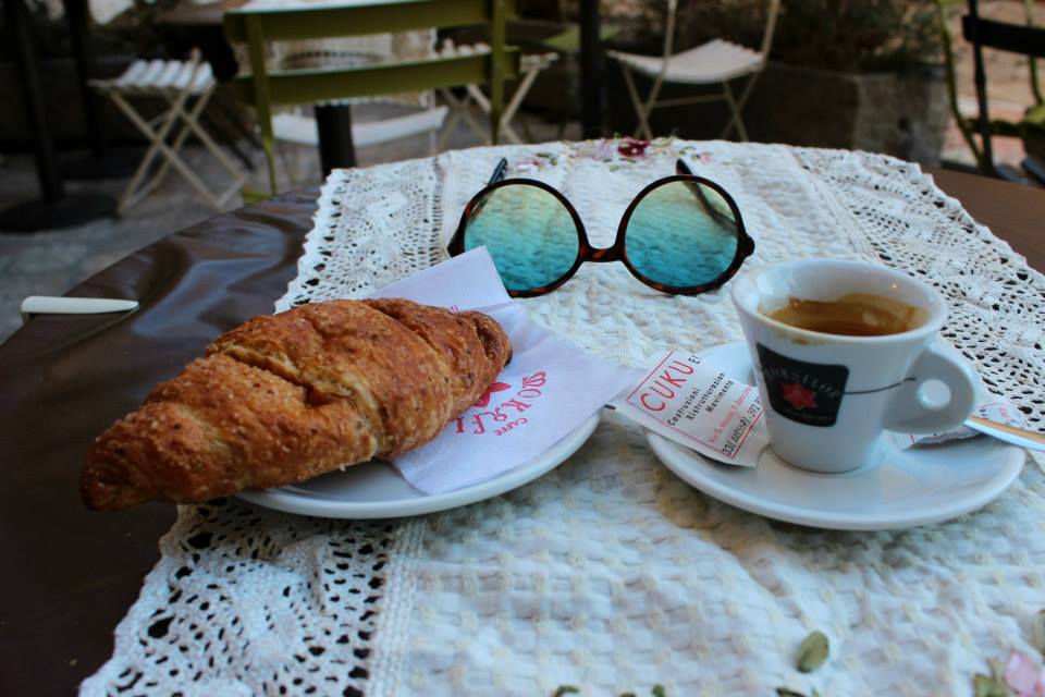 Italian breakfast in Assisi, Italy, with a croassaint and a coffee