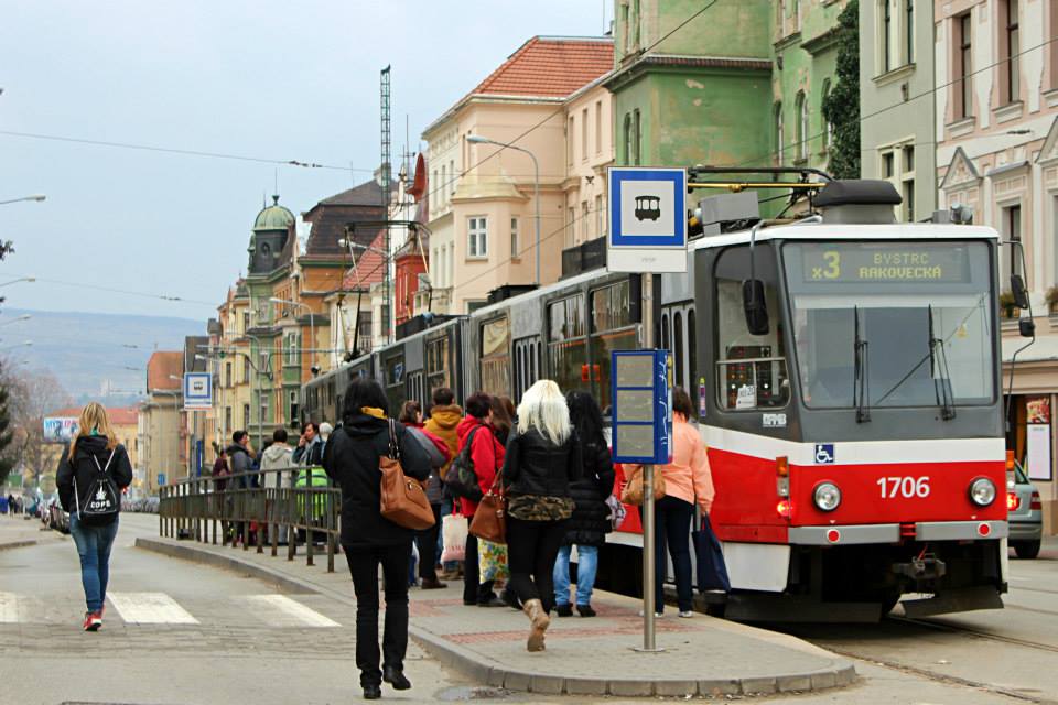 street of brno, in czech republic, with locals going on the bus