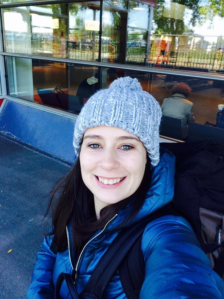 solo female traveler at the airport in Paris, enroute Pisa