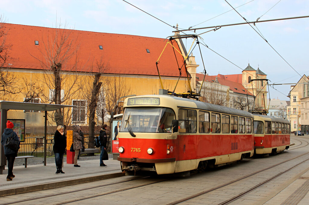 red tram passing by in the streets of bratislava